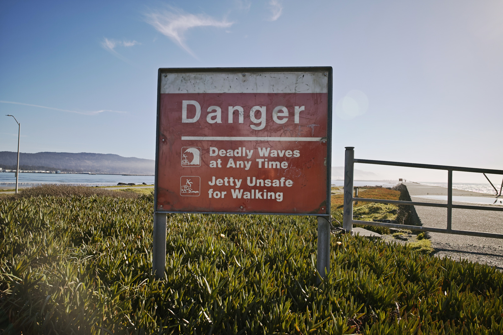 The beach, (or rather, a warning sign on the beach,) Crescent City, California -- my first stop.