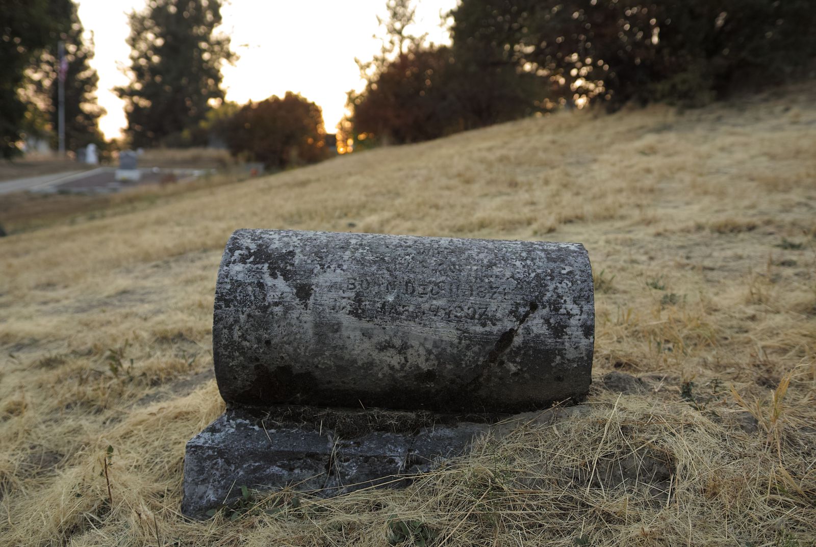 This headstone reminds me of a steamroller.