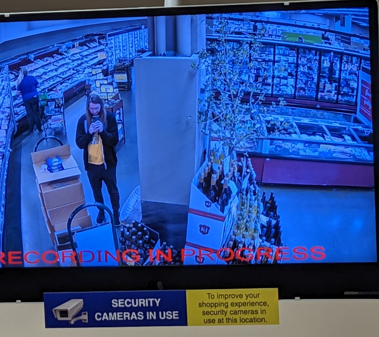Self-portrait at the QFC. As you can see, my shopping experience was enhanced greatly by the security cameras.