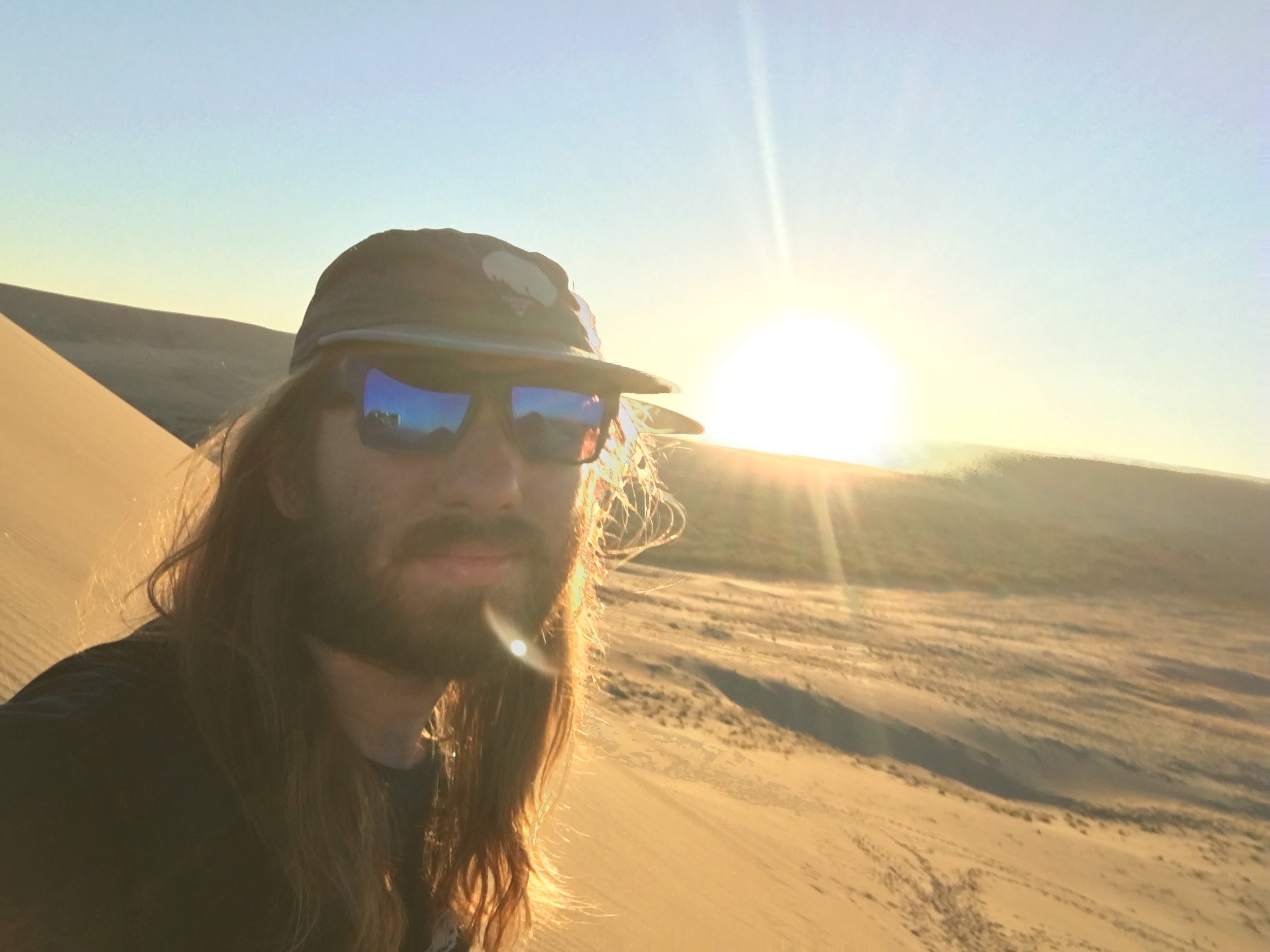 A top of dune phone selfie.