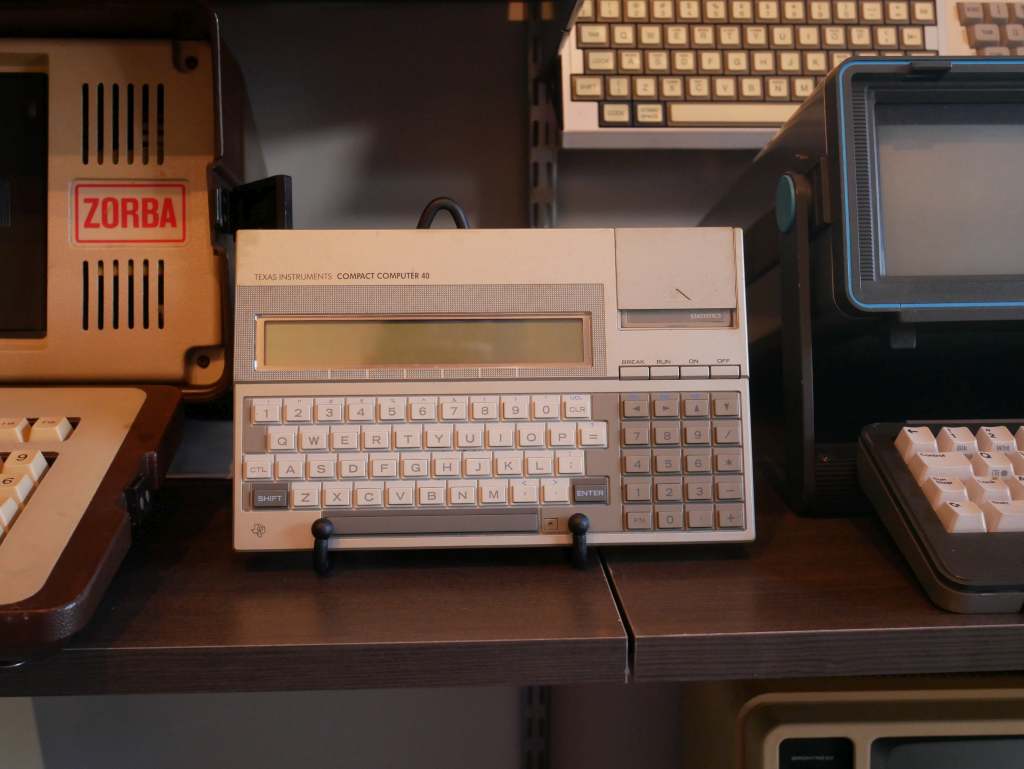 This small and simple portable computer, also from 1983 could run one BASIC program at a time. The Zorba is on the left for scale.