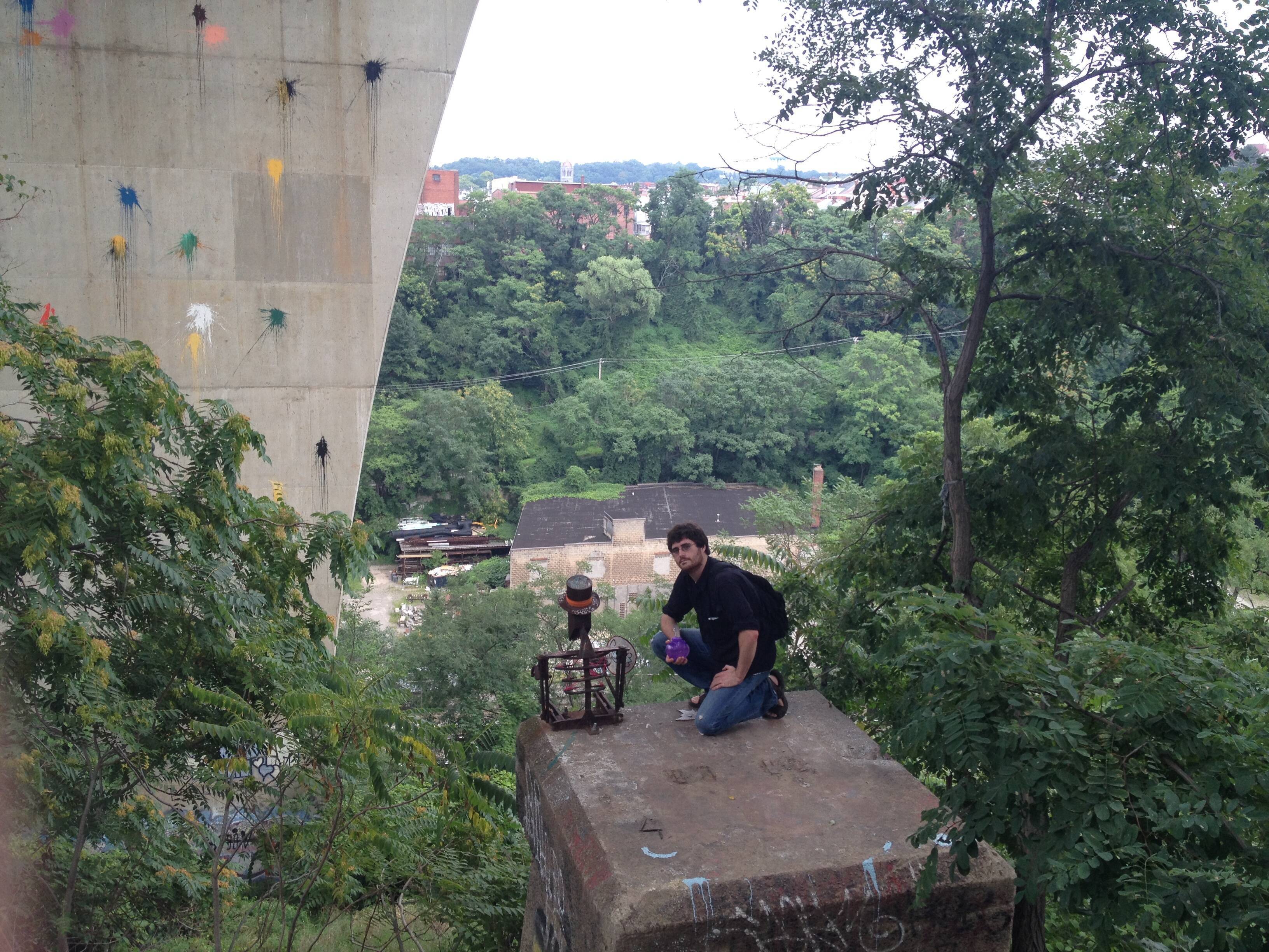 Friend Matt O. appreciating a pirate sculpture underneath the Bloomfield Bridge. (July 2016)