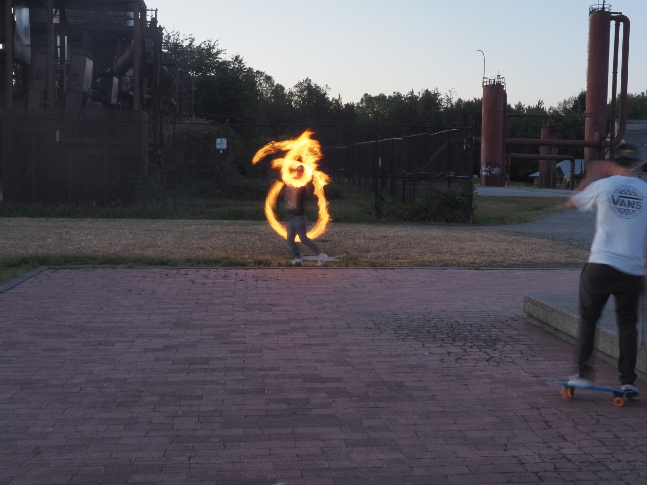 Playing with fire, one second exposure